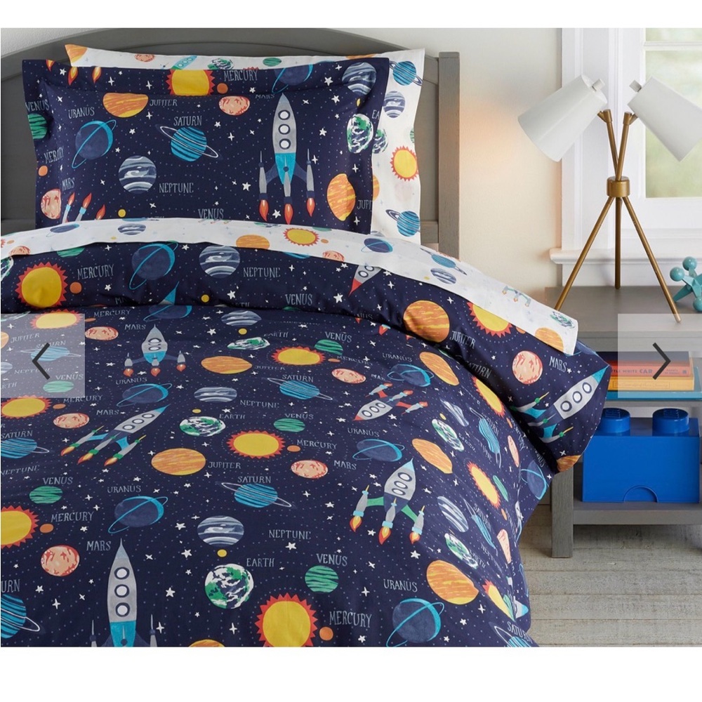 Pottery Barn Kids Navy Blue Space Bedding Set with Multicolor Planets.
